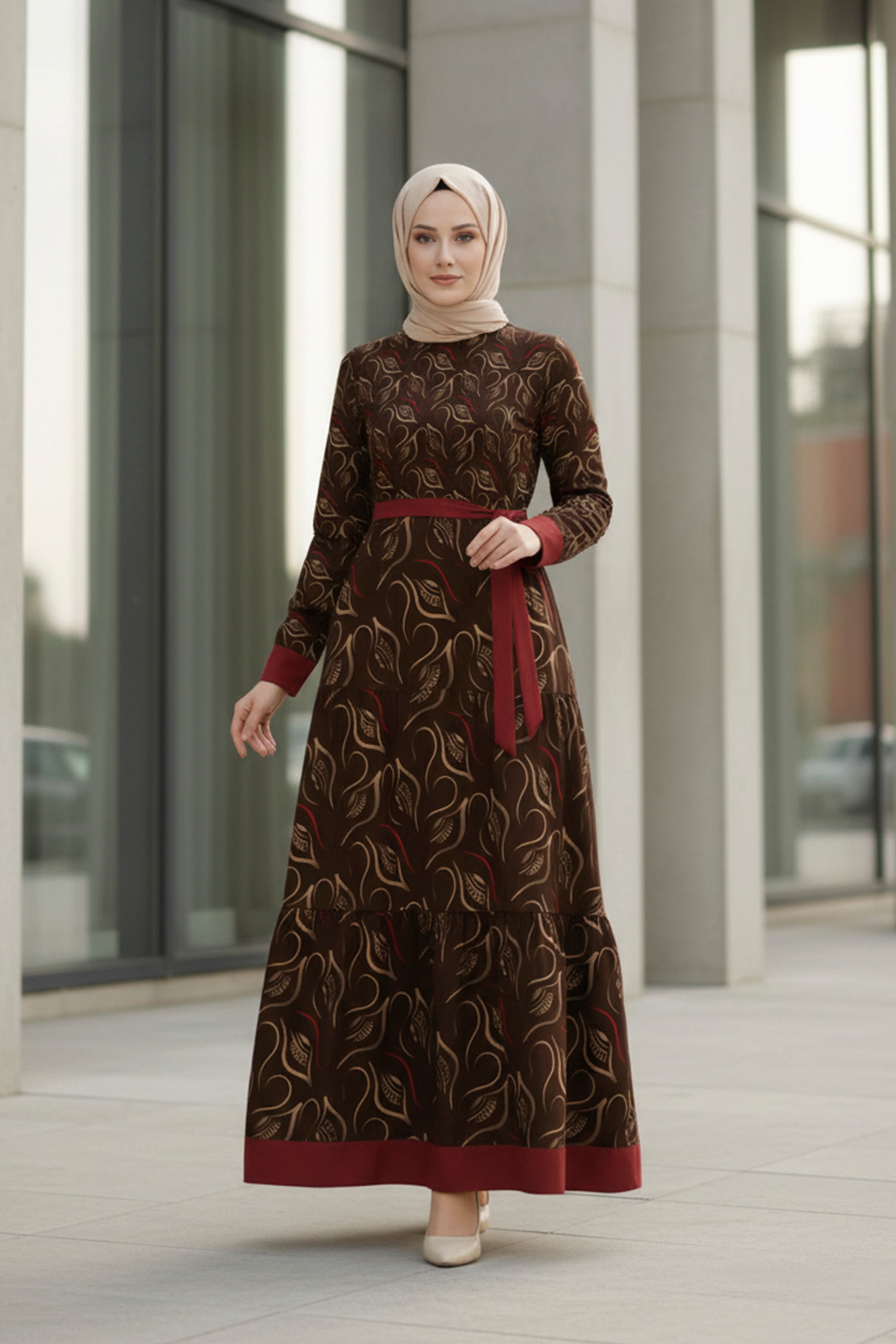 Back view of ruby noir modest maxi dress with botanical pattern and flowing skirt